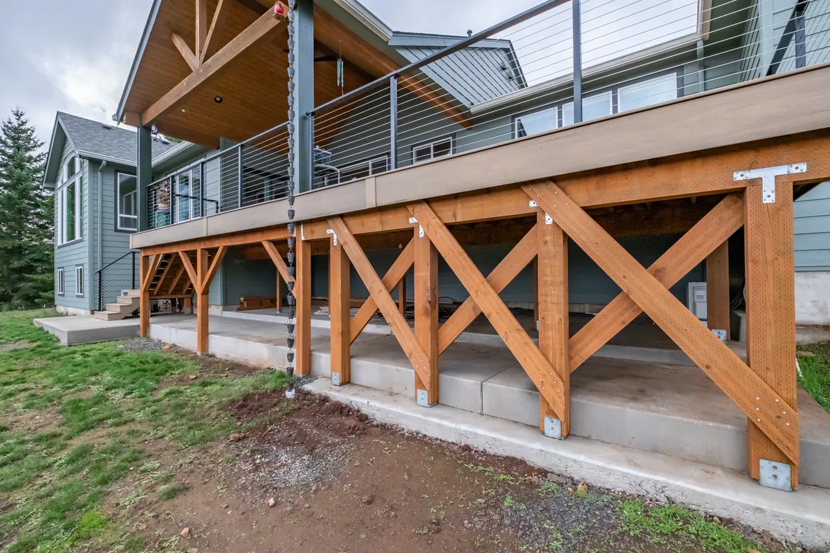 Deck stairs and the timber framing reinforced for the hot tub
