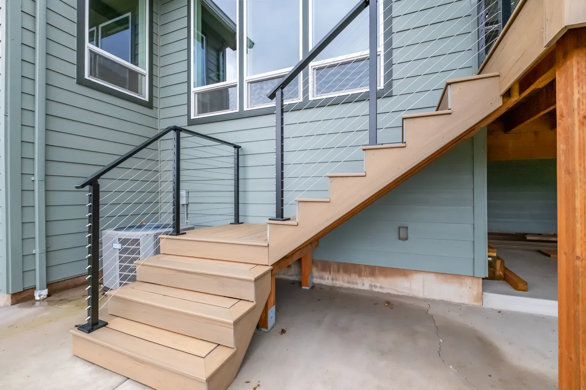 Deck stairs and the timber framing reinforced for the hot tub