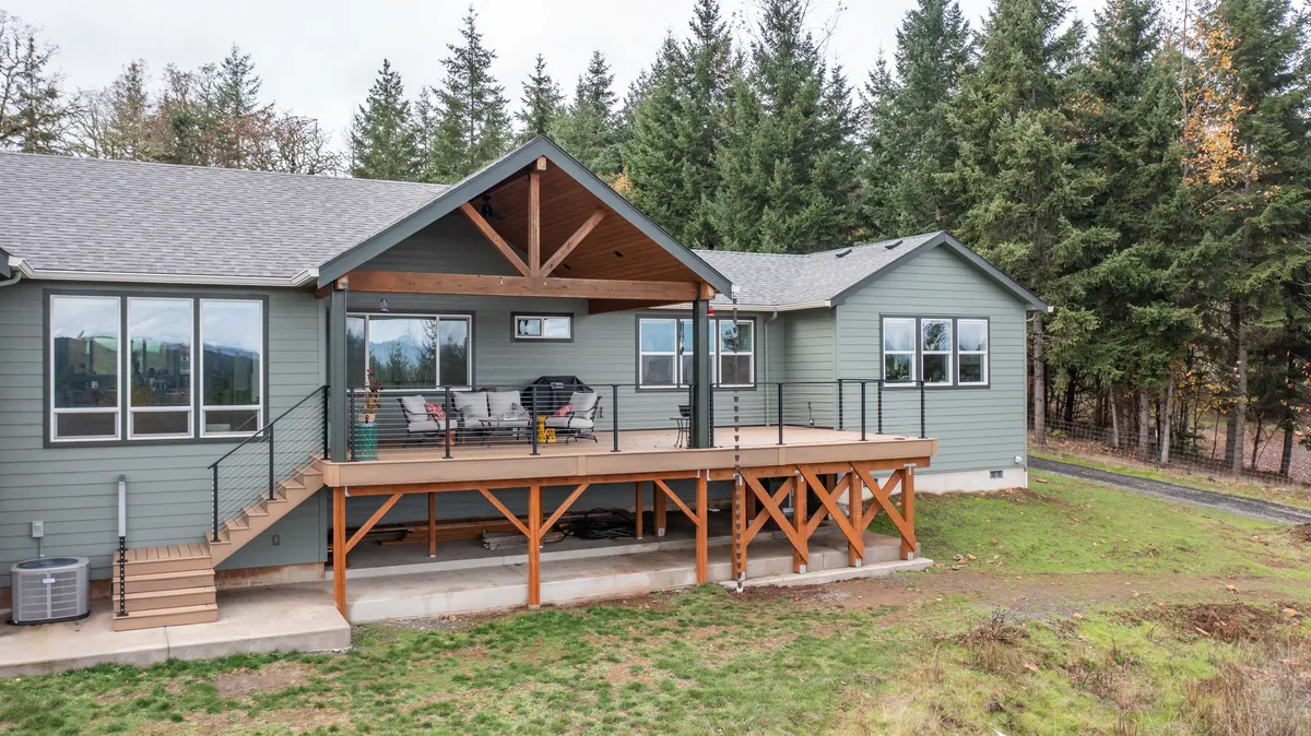 The deck and the addition from the yard