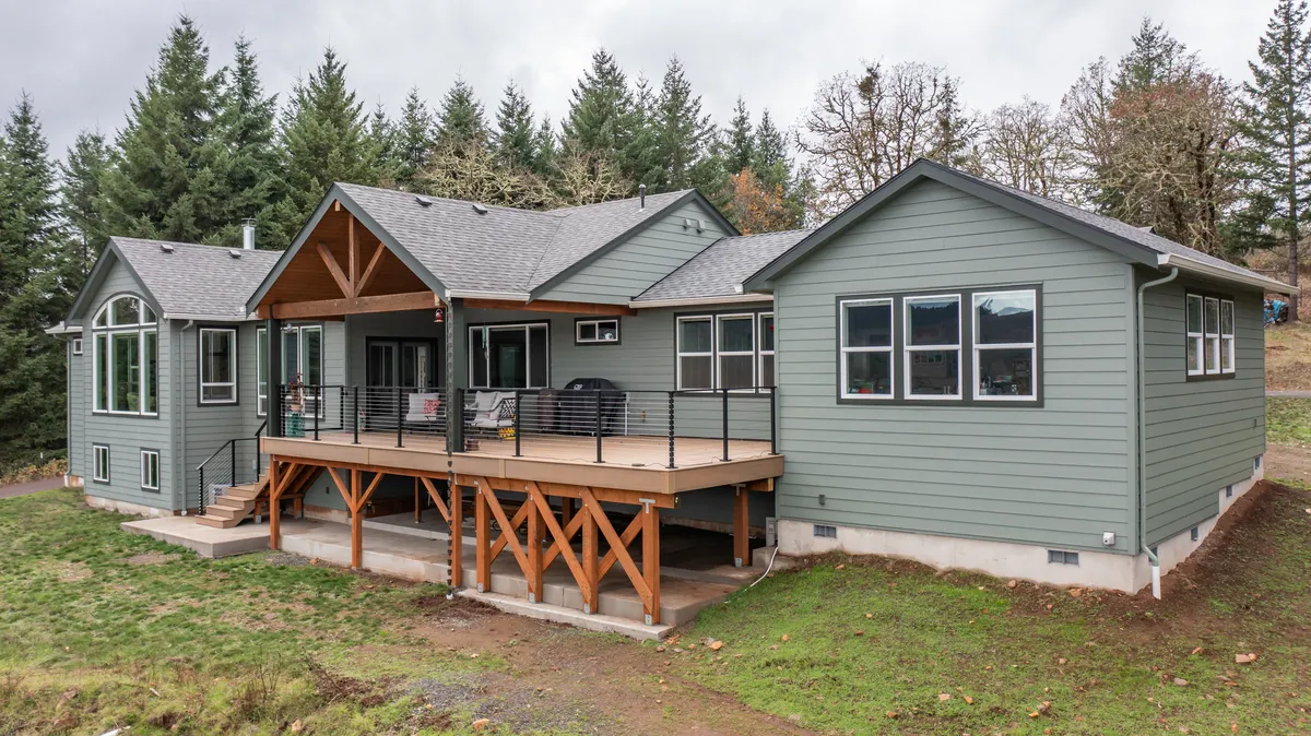 The deck and the addition from the yard