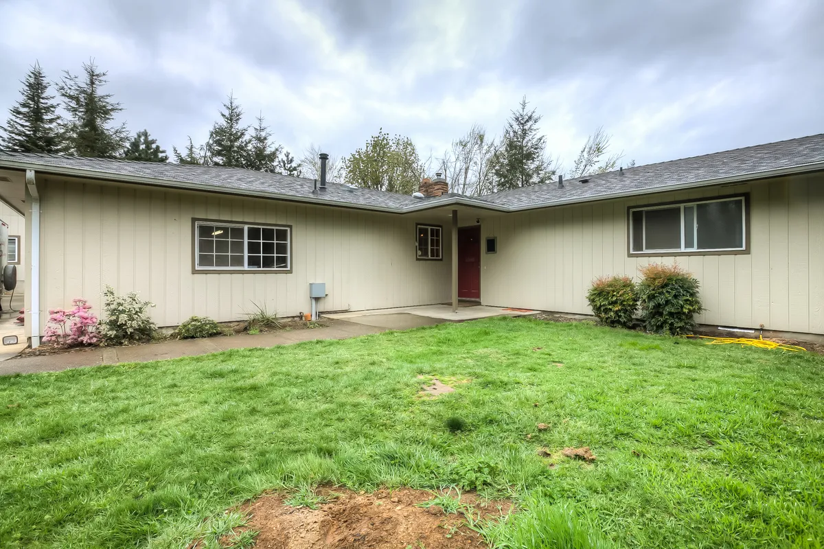 The front of the home with new landscaping