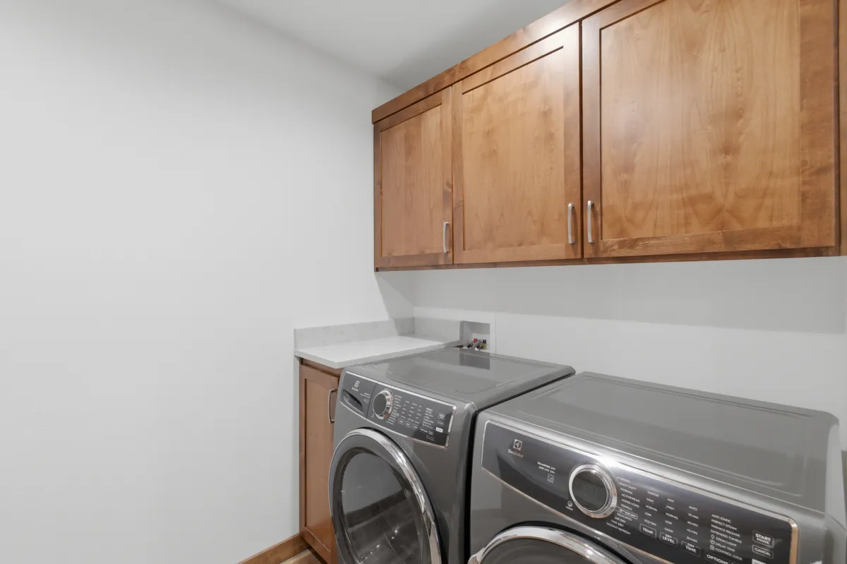 Laundry and work counter with alder upper cabinets